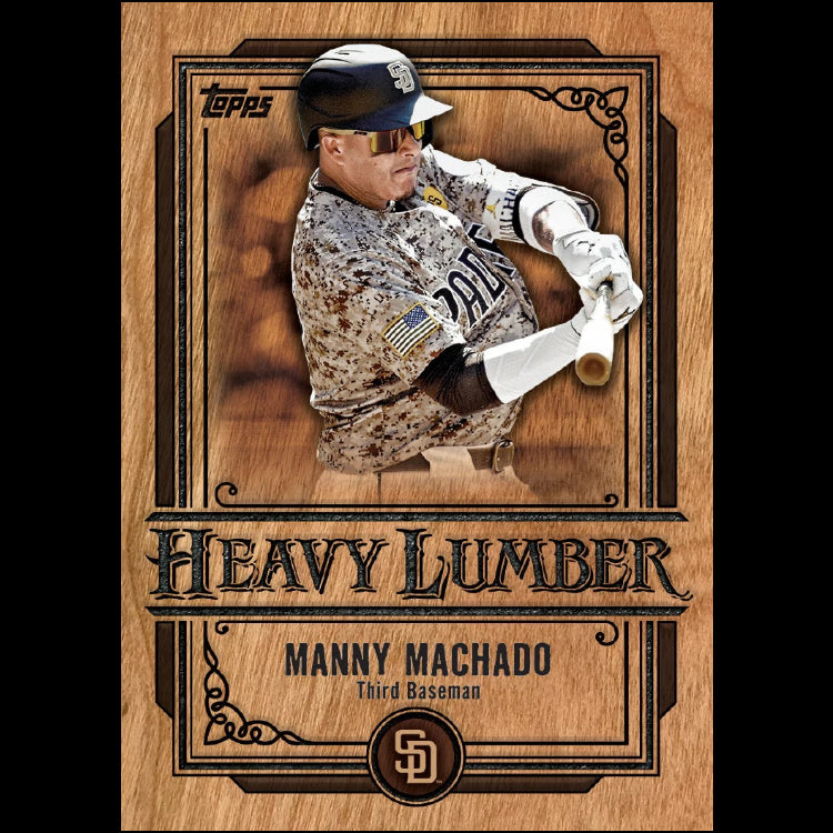 Baseball trading card featuring Manny Machado with a wooden border and 'Heavy Lumber' text.